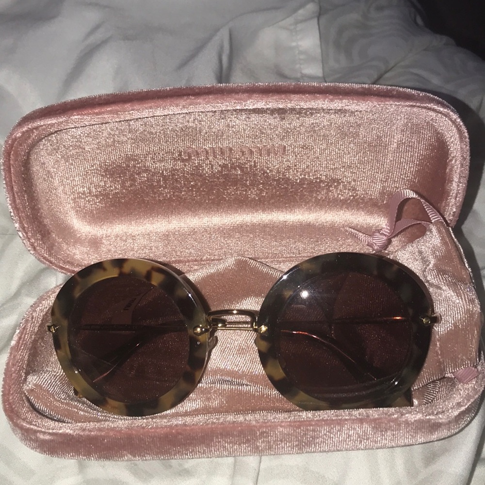 MIUMIU round glasses